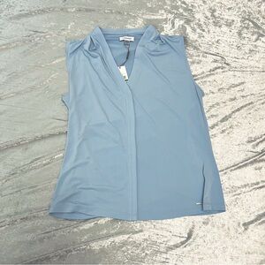 Large Tags on Calvin Klein Sleeveless Blouse- light blue